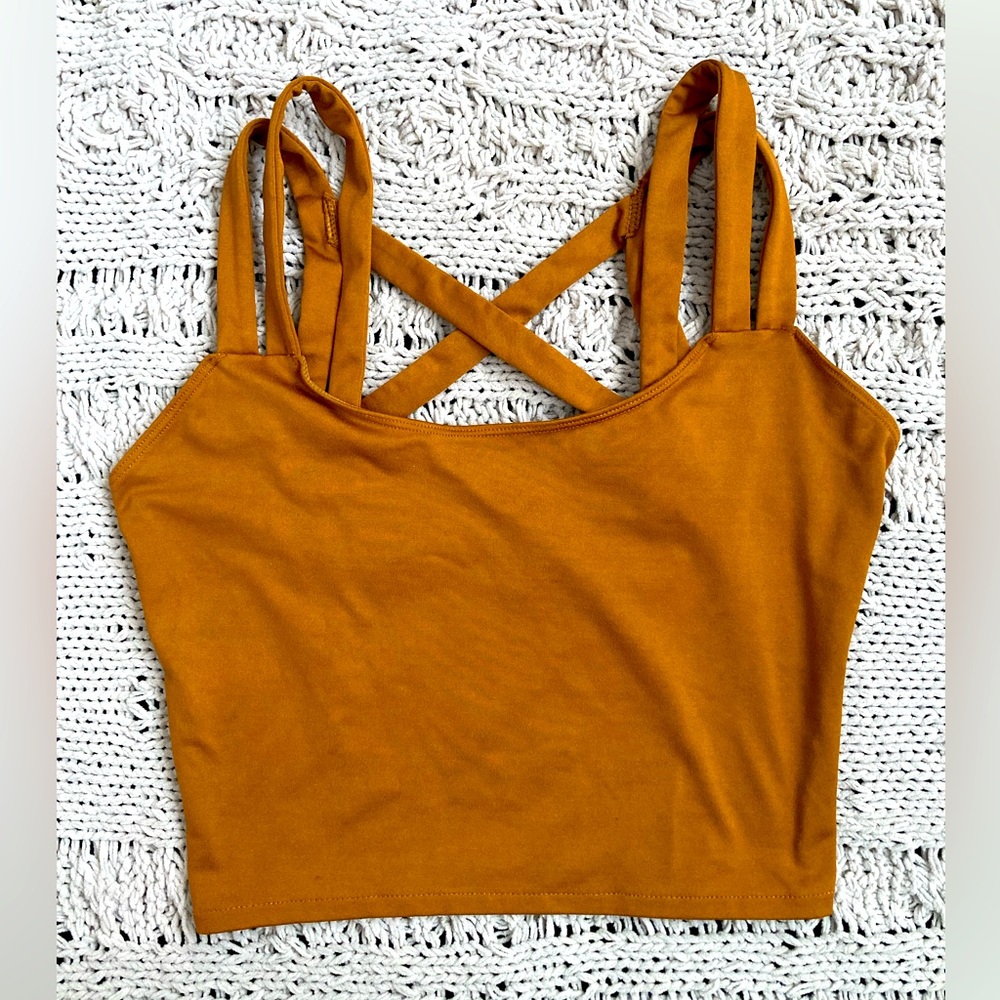 Wolven criss cross yoga top in color turmeric size medium